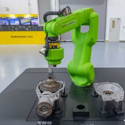 6 Axis Fanuc CRX-5iA Cobot Robot Arm Dengan CNGBS Robot Pakaian Untuk Penanganan Sebagai Robot Kolaboratif