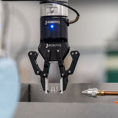 Suku cadang robot gripper ROBOTIQ Hand-E bergabung dengan robot kolaboratif UR